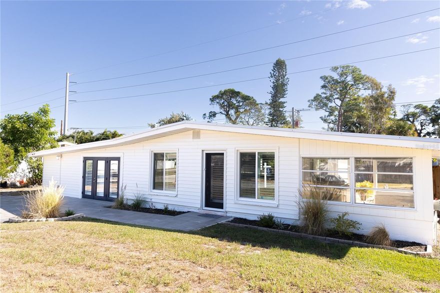 Welcome to 8717 Peggy Avenue! This charming house is now available for sale in the neighborhood of Tropical Shores. Boasting a cost-effective boating community, this property offers a fantastic opportunity to enjoy the Florida lifestyle.

With three bedrooms and two bathrooms, this house provides ample space for comfortable living. The 2017 comprehensive remodeling ensures that you'll have peace of mind with new features such as a roof, AC unit, and windows. Additionally, you'll benefit from newer amenities like a reverse osmosis water filtration system, whole house water softener, and septic system.

Inside, the freshly painted interior creates a welcoming atmosphere. The split plan layout offers privacy, with the primary suite featuring an updated ensuite bathroom and sitting area. The other two bedrooms are located on the opposite side of the house, along with an additional upgraded full bathroom.

As you step outside, you'll find that recently refreshed landscaping and fenced yard perfect for privacy and security. Enjoy outdoor gatherings with family and friends on the two patios while savoring delicious meals prepared on the grill. Need extra storage? No problem! This property also includes a convenient storage shed.

Living in Tropical Shores comes with exciting perks. Take advantage of the boating and kayak access.  Inn addition there are boat slips, kayak racks, and a boat ramp and club house available for an additional fee ranging from $275 to $1100 annually.

Don't miss out on this incredible opportunity to own a home in Tropical Shores