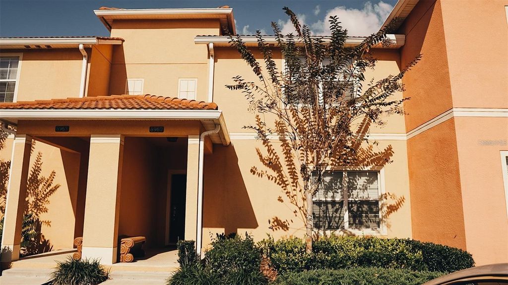 Photo of 8961 Bismarck Palm Rd, Kissimmee, FL 34747 (MLS # O6389133)