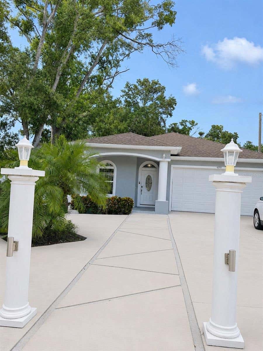 Photo of 4293 W Humphrey Street, Tampa, FL 33614 (MLS # TB8539806)