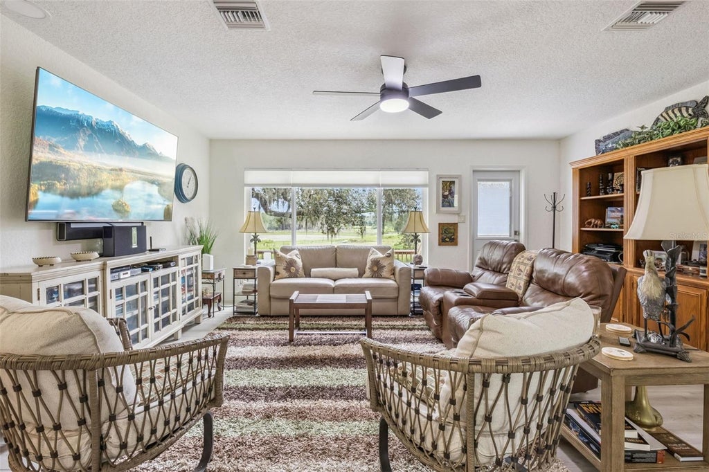 Photo of 1476 Spring Lake Road, Fruitland Park, FL 34731 (MLS # G5117362)