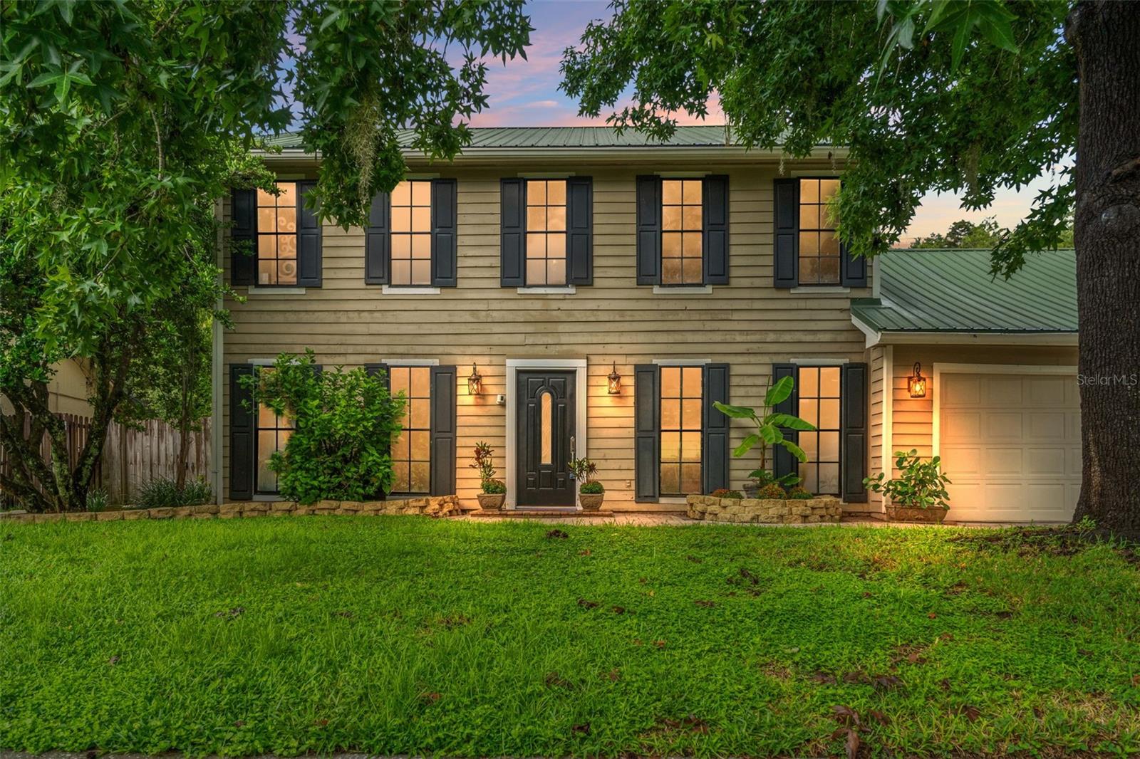 Welcome to your dream retreat! This stunning 2-story home is full of charm, character, and room
for everyone to enjoy. Upstairs, you’ll find four spacious bedrooms and two full baths,
including a luxurious primary suite that feels like a spa escape, complete with hand-painted
artisanal double sinks, a show-stopping oversized corner soaking tub crowned with a
chandelier, and a separate walk-in shower. Elegant bamboo flooring flows throughout upstairs,
with stylish tile in the bathrooms. Downstairs is built for living and entertaining! Gather around
the cozy wood-burning fireplace in the family room, host game nights in the large game room,
or mix up drinks at the wet bar. The chef’s kitchen is a showpiece with gleaming granite
countertops, a unique penny-tile backsplash (Can you guess how many pennies?), rich redwood cabinetry, and an island that’s
perfect for cooking or conversation. You’ll also enjoy the sophistication of Italian tile and brick
flooring, paired with designer lighting and ceiling fans throughout, absolutely no carpet in this
home! Need extra space? The huge bonus room (20x16) with its own sink offers endless
possibilities, whether you envision a 5th-bedroom, art studio, home office, or billiards room.
Step outside and prepare to be amazed! The sparkling pool glistens under the sun, while the
fenced backyard provides privacy and room to roam. Entertain in style at the Tiki bar, fully
equipped with a Margarita machine, popcorn maker, and plenty of space for friends and family
to gather. Set on over half an acre with serene conservation views, this property offers peace
and privacy while still being close to shopping, dining, cultural venues, and nature trails. This
home is more than just a place to live; it’s a lifestyle waiting to be embraced! Donations from
this sale will be provided to Working Women of Tampa Bay 501c3.