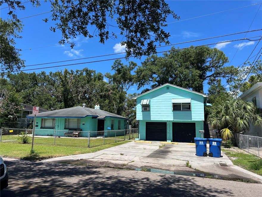 Excellent opportunity to own this income-producing triplex just one mile from vibrant downtown St. Petersburg. This unique property includes a duplex with two spacious units side by side plus a separate garage apartment situated above a 2-car garage, offering three total rental units on one lot. Each unit features a private entrance, comfortable layouts, and abundant natural light, making them highly desirable for tenants. The detached garage apartment provides additional privacy and flexibility for short-term or long-term rental income, while the 2-car garage adds extra value for storage or parking. Located in a high-demand rental area with consistent cash flow and excellent potential for future rent increases, this property is perfect for investors or buyers looking to live in one unit while renting the others. Zoned for multifamily use and separately metered for electric, this property is ready to generate revenue from day one. Don’t miss your chance to own a solid investment in one of St. Pete’s fastest-growing neighborhoods! Contact me today for financial details or to schedule a private tour.