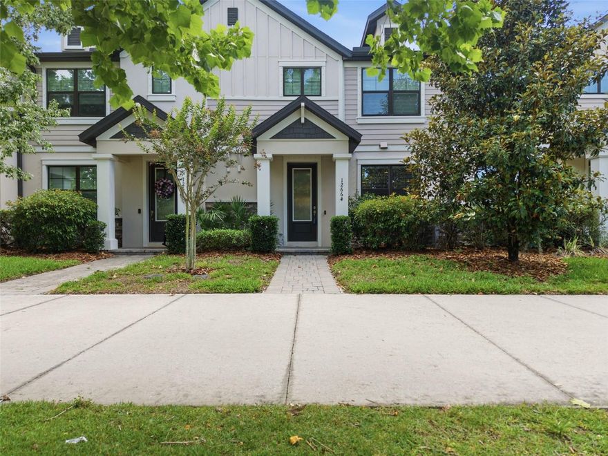 Welcome to 12664 Rangeland Blvd, where everyday living feels like the beginning of something bigger.

Imagine waking up in one of Tampa Bay’s most sought-after communities, where mornings begin with peaceful walks along scenic trails, afternoons are spent poolside, and evenings are filled with bike rides, fresh air, and sunsets over the preserve. This is more than a home… it’s a lifestyle designed for connection, relaxation, and enjoyment.

Perfectly positioned across from Cunningham Lake and the preserve, this beautifully designed MI Homes townhome blends modern luxury with a warm, timeless aesthetic. Step inside and you’re immediately greeted by soaring ceilings, natural light, and an open-concept layout that creates a seamless flow for both everyday living and entertaining. One of the standout features of this townhome is the thoughtfully designed layout, with the spacious family room positioned at the front of the home as you walk in — a layout that is not commonly found in many townhomes in the area. The home also features an oversized pantry, offering exceptional storage and functionality that is another highly desirable feature rarely seen in similar properties. Combined with its open-concept feel and well-designed living spaces, this home offers both comfort and convenience for everyday living. 

The kitchen sits at the center of it all, bright, spacious, and thoughtfully designed. Whether preparing a quiet meal or hosting guests, this space naturally brings everyone together.

Upstairs, you’ll find two generously sized secondary bedrooms along with a private owner’s retreat designed for comfort and convenience. The suite features vanities, quartz countertops, a beautifully tiled walk-in shower with glass enclosure, and ample closet space. A second full bathroom with a tub/shower combo adds functionality and flexibility.

Step outside to your screened-in outdoor living space, perfect for enjoying Florida’s year-round indoor-outdoor lifestyle. Whether relaxing, entertaining, or simply unwinding, this private space extends your living area effortlessly.

Beyond the home, the Starkey Ranch community offers an exceptional living experience with multiple resort-style pools, expansive parks, and miles of walking, biking, and nature trails. A full-time lifestyle team coordinates community events throughout the year, creating opportunities to connect and enjoy everything the neighborhood has.

Conveniently located near Starkey K-8, local dining, Publix, medical facilities, and with easy access to the Veterans Expressway, commuting to Tampa, nearby golf courses, and the Gulf beaches is simple and efficient.

With a low-maintenance HOA that includes exterior upkeep, lawn care, sewer, and trash, this home allows for more time spent enjoying the things that matter most.

This is more than just a place to live! It’s an opportunity to experience one of Tampa Bay’s most vibrant and thoughtfully designed communities.