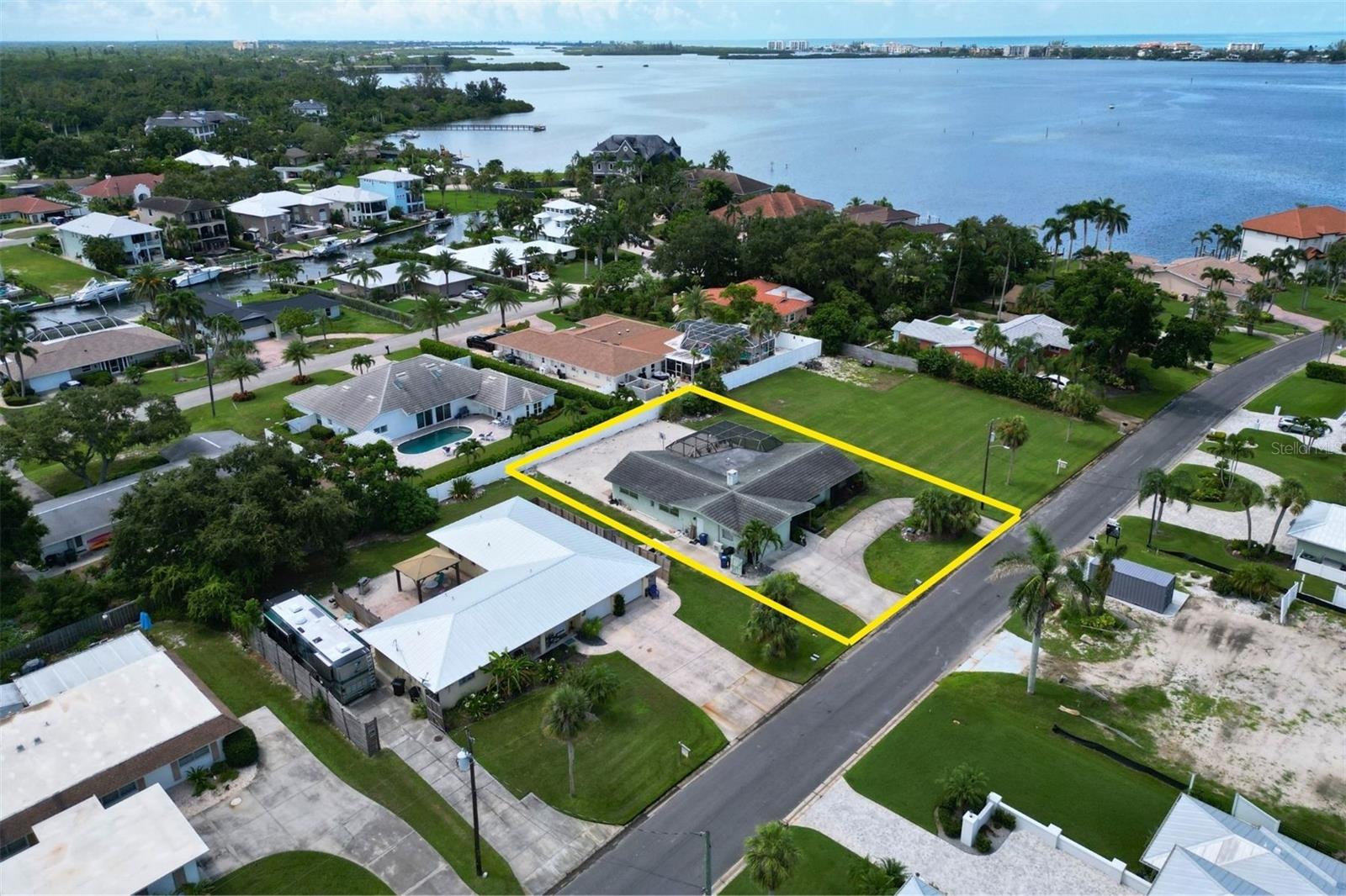 This charming and versatile 4-bedroom, 3-bathroom home offers a spacious layout and unique potential for customization or expansion. The interior flows seamlessly to a private screened-in in-ground pool—ideal for entertaining or relaxing under the Florida sun. With access to a shared community boat dock, this property is perfect as a primary residence, seasonal getaway, or income-producing rental.
1848 Southpointe Dr may be purchased individually or as part of a rare assemblage opportunity totaling 38,301 SF across three parcels. In addition to this single-family home, the assemblage includes a 1,933 SF duplex and an adjacent vacant lot—providing unmatched flexibility for redevelopment, investment, or multi-generational living.
