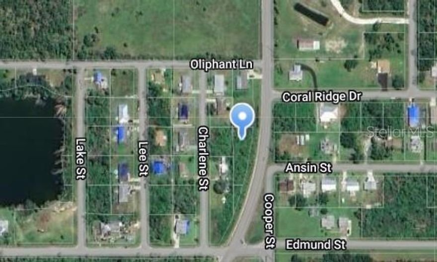 Price is REDUCED to SELL * Bring Your Offers * 0.25 Acre Lot 68 ft deep on North side, to 33 ft deep on South side, by 201 ft wide, with 204 feet of Road Frontage on Cooper Street, Punta Gorda located in Lake Emma community * Own a piece of Paradise with no HOA fees or Condo Commandoes *  Check with Charlotte County for permitting information.  The property includes two lots; lot 34 (2625 Cooper St) and lot 33 (2701 Cooper St) * see legal description & listing images for reference.  This Lot is in an excellent price range, conveniently located, close to Punta Gorda Airport, Fishermen's Village, Gilcrest Park, Historic Downtown Punta Gorda with its Live Entertainment including the famous Celtic Rae’s Irish Public House and Restaurant, Biking, Fishing, Boating, Shopping, Antiquing and Fine Dining.  With County approval; this lot is perfect for building or as a future investment, the new city of Babcock Ranch is located inland to the East.  There is quick access to Interstate I75 via Exit 164 to the north via Duncan Rd and Exit 161 to the south via Jones Loop Rd.  Seller Disclosure is available.  There is a yard sign to help locate. Property Address for GPS: 2625 Cooper St and / or 2701 Cooper St, Punta Gorda, 33950 * Bring your offer today * HT262  * Charlotte County Property Appraiser office shows it to be zoned: RSF5 contact them directly to confirm usage, Zoning Description: Res Single Fam 5 Units/Acre-Rsf5 * Flood Zone Code: AE *