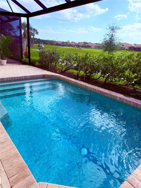Photo of 9448 Forest Hills Circle, Sarasota, FL 34238 (MLS # TB8484374)