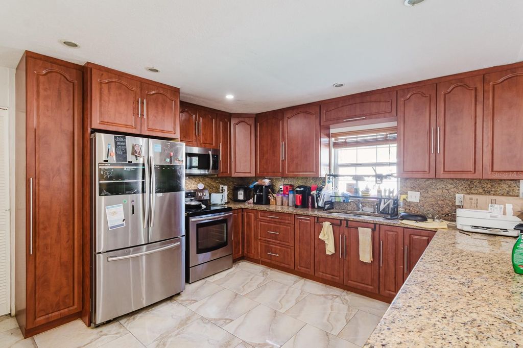 Photo of 104 Druid Hills Road, Temple Terrace, FL 33617 (MLS # TB8457406)