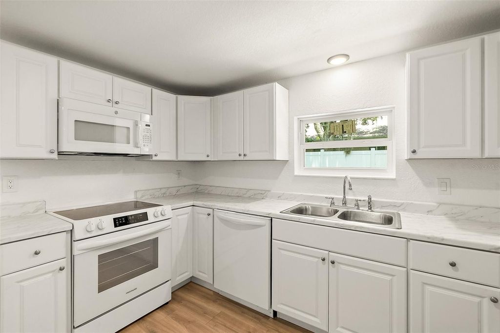 Photo of 607 Wayne Avenue, New Smyrna Beach, FL 32168 (MLS # V4949520)