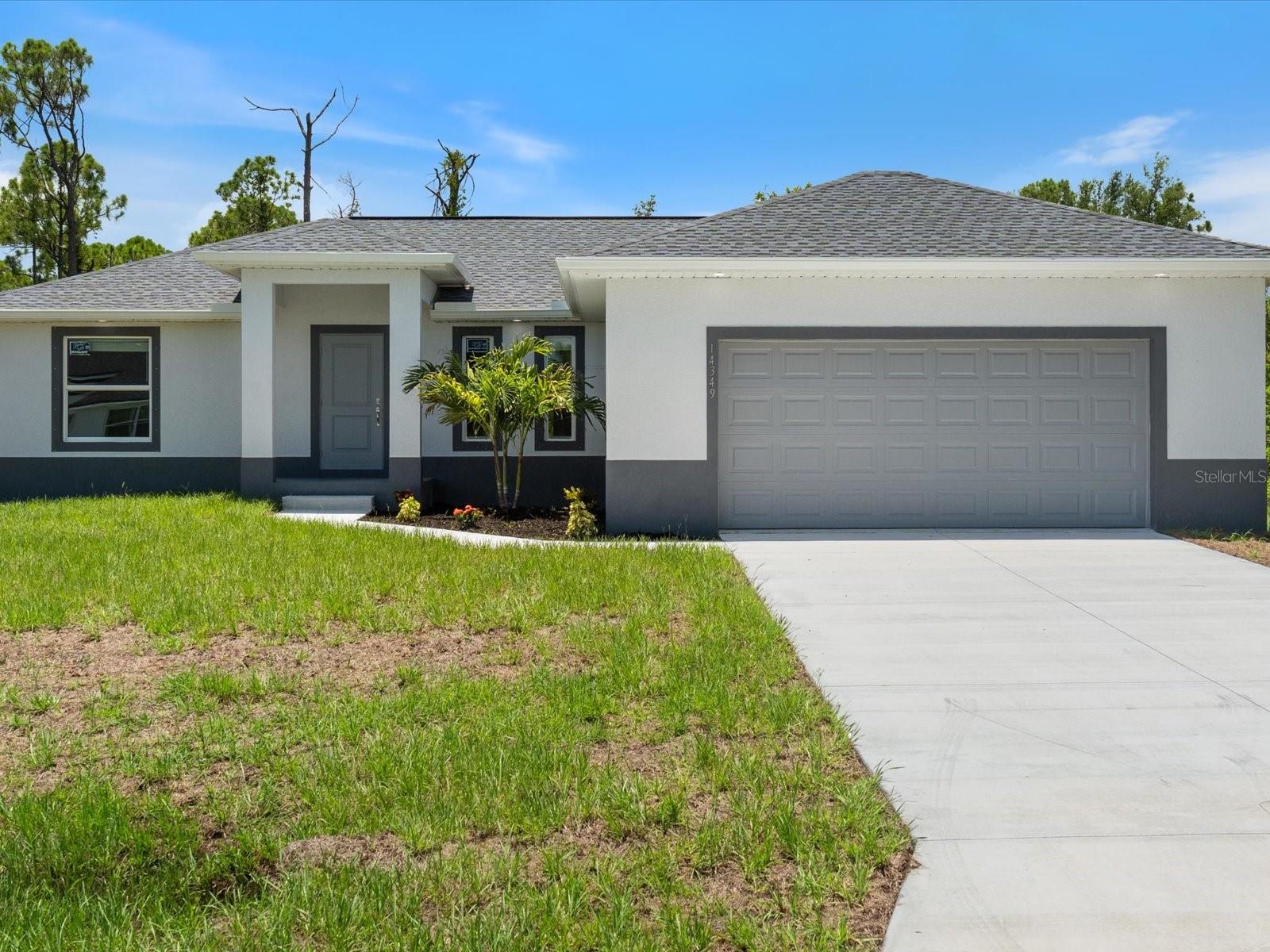 Move-in ready brand new custom built 3 bedroom, 2 bathroom home located on a quiet street in the canal community of South Gulf Cove. Open and split floorplan with high end finishes including porcelain plank flooring throughout, Quartz countertops in kitchen and baths, fully tiled showers with zero edge entries, window blinds, and luxury lighting package. Kitchen boasts solid wood, soft-close cabinets with nickel-finish hardware, subway tile backsplash, island with seating & pendant lighting, large pantry, and all four appliances in stainless steel finishes. Screened lanai with Clearview finish offers a space to enjoy the serene backyard in Florida’s fabulous sunshine! Public water, public sewer, with no flood insurance required! Built to the highest standards and codes by a local award winning builder, this home has 100% hurricane coverage along with hip roof, stem wall foundation and block construction. Bring your boats and RV’s, the community has 2 boat ramps, 5 parks, and is golf-cart friendly! Not in a hurry, builder has many floorplans and can build on your lot.