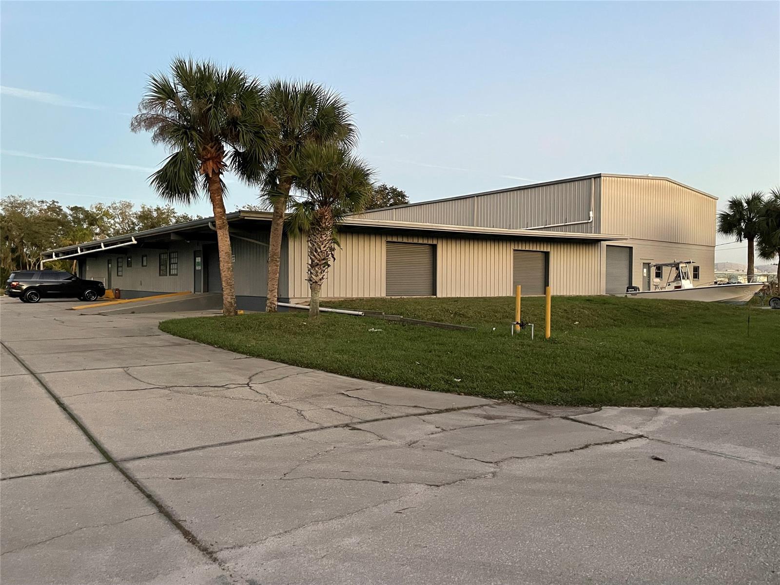 Light Industrial Zoned property with ~15,850 SF of warehouse space, 18 parking spaces, 7 separate & updated offices, a conference room, & a common area that would function well as additional offices or a showroom. There are 2 full & 2 half bathrooms, newer HVAC & water heater, & auto LED lighting. 11 overhead doors and 2 back in loading docks. Endless potential in a FAST growing industrial area of Edgewater, FL. This building could accommodate your growing business and is easy to access highways and other major cities. Distance to I-95 – 4.2 Miles, Distance to I-4 – 21 Miles, Distance to I-95 – 4.2 Miles, Orlando- 58 Miles, Jacksonville – 112 Miles, Tampa- 142 Miles, Miami 244 Miles.