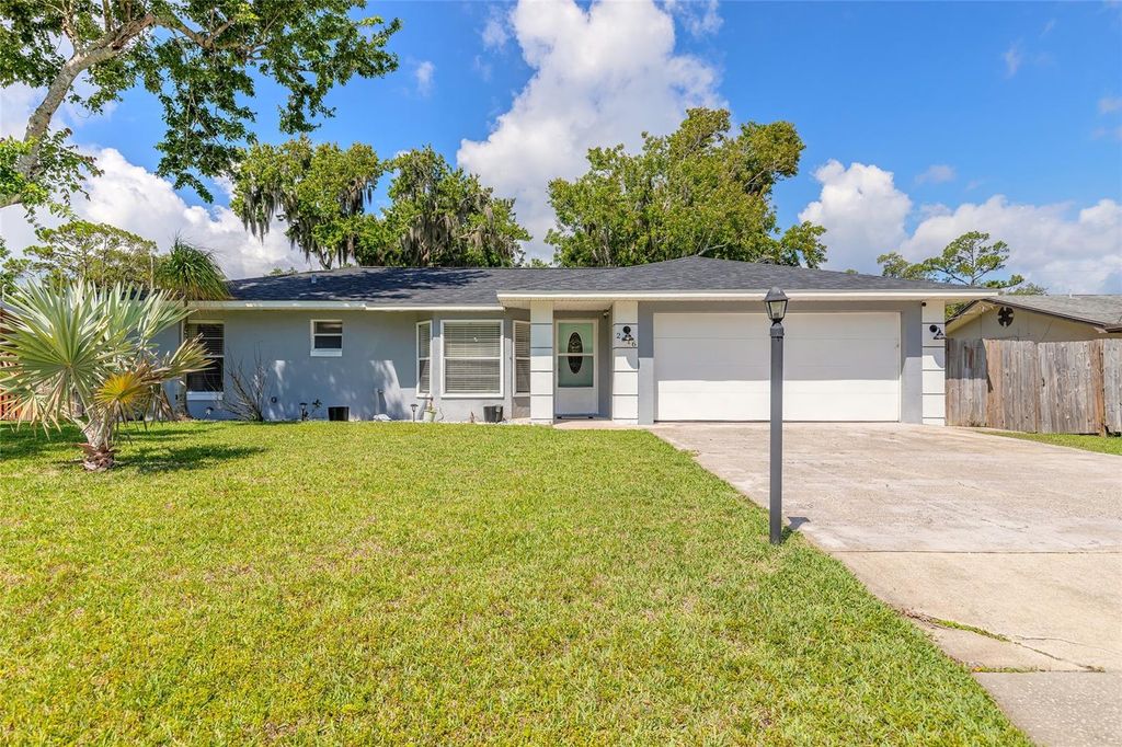 Photo of 2616 Woodland Drive, Edgewater, FL 32141 (MLS # NS1088304)