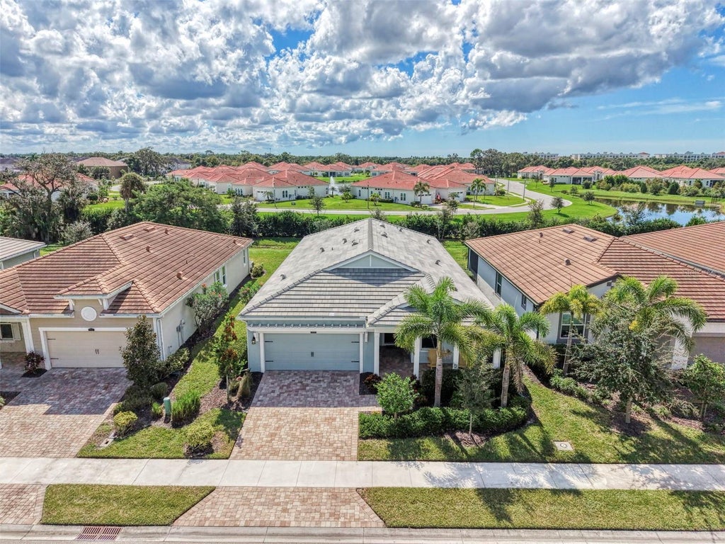 Photo of 5941 Long Shore Loop, Sarasota, FL 34238 (MLS # N6146255)