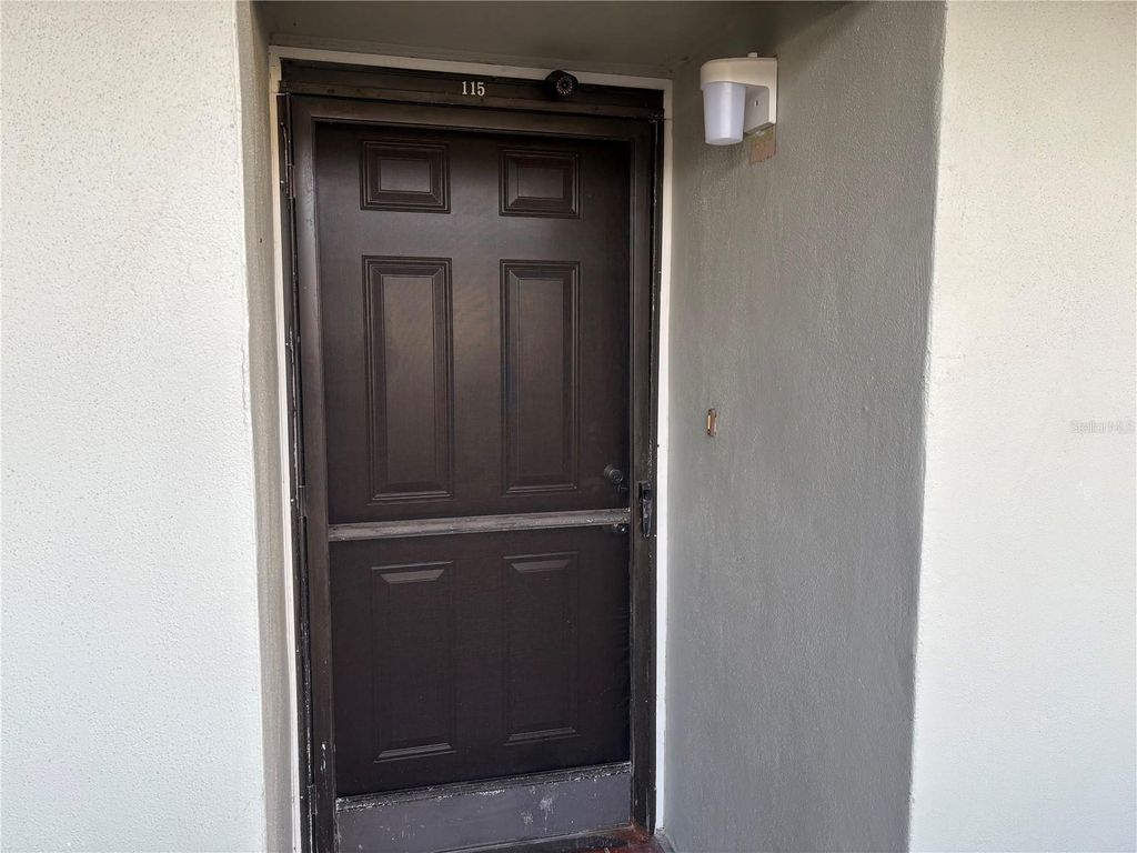 Photo of 5157 Silent Loop #115, New Port Richey, FL 34652 (MLS # W7881842)