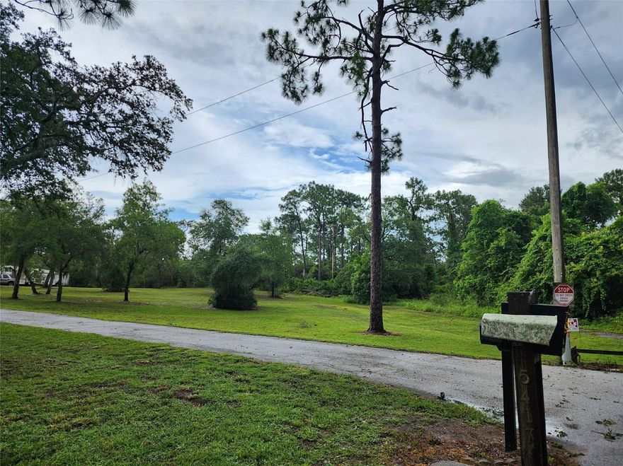 Quiet, partially cleared, irregularily shaped 2.23 +- acre buildable lot at the end of a dead end street. Zoned R-1A directly on the Little Econlockhatchee River. The east 1/3 of the property that is adjacent to the river is in Flood Zone AE. This park-like setting is still close to downtown Orlando, the airport, theme parks, UCF and State Road 417.