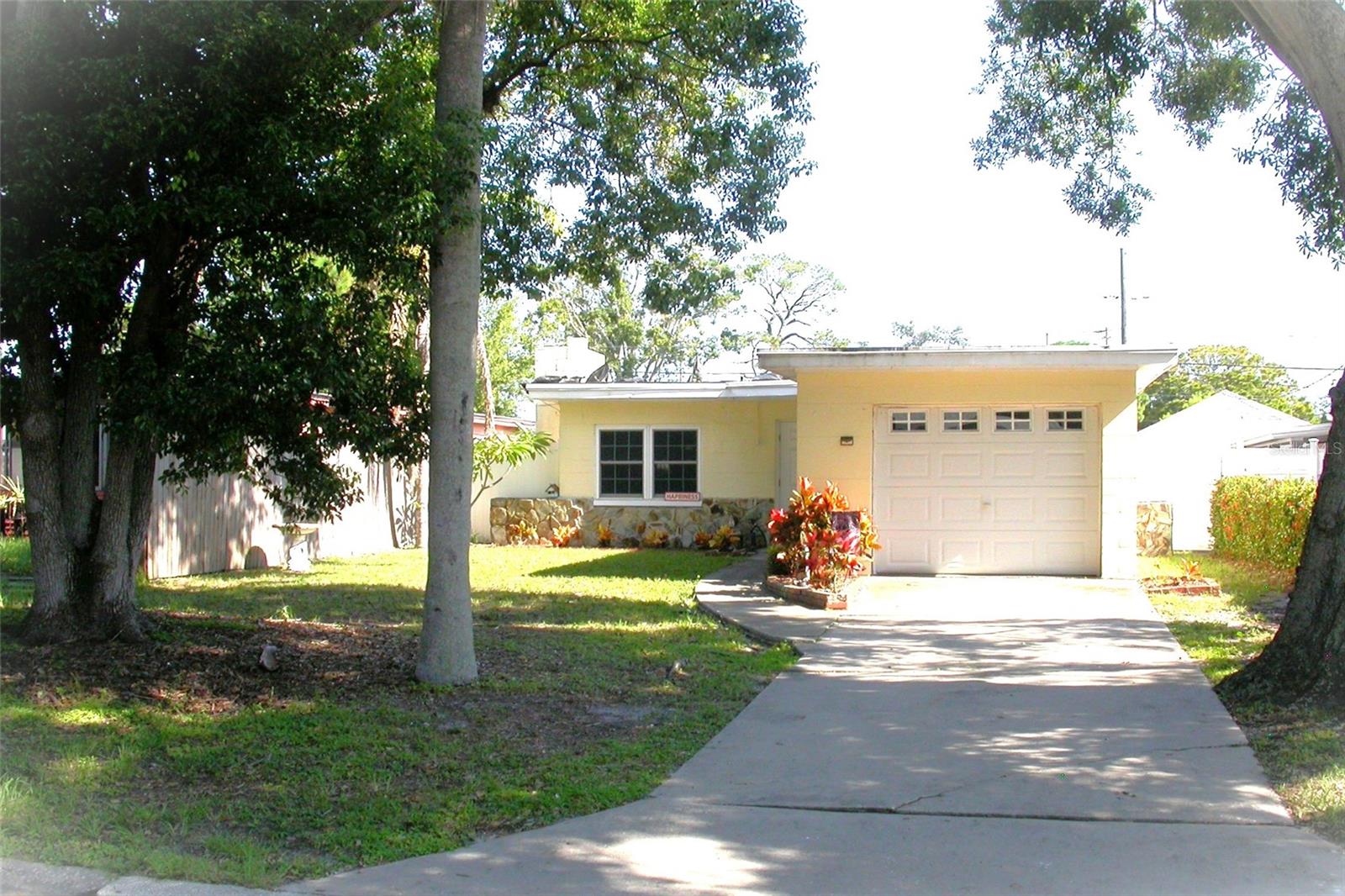 Home in Jungle Terrace – Spacious & Full of Potential
Located on a quiet street in the desirable Jungle Terrace neighborhood, this well-maintained home features a cozy Zarian stone fireplace—perfect for those chilly Florida evenings. The layout includes two oversized bedrooms, each offering generous closet space.
Enjoy the convenience of an attached 1-car garage and a separate laundry room just off the kitchen. The kitchen features durable tile flooring, the living room is finished with vinyl, and the bathroom boasts stylish bamboo flooring.
Step outside to a spacious backyard with a built-in grill, ideal for entertaining. There’s plenty of room to add a pool and transform the space into your private outdoor oasis.
Additional updates include a new A/C unit (less than a year old) and a brand new hot water heater. The home is located in Flood Zone X.
Situated close to bus lines, shopping, the VA hospital, I275 and is just a short drive to our beautiful sugar sand beaches. Plus, the Pinellas Trail, spanning approximately 47 miles, is just two blocks away—perfect for biking and sunny adventures.
This property offers fantastic potential—schedule your showing today and imagine the possibilities!
