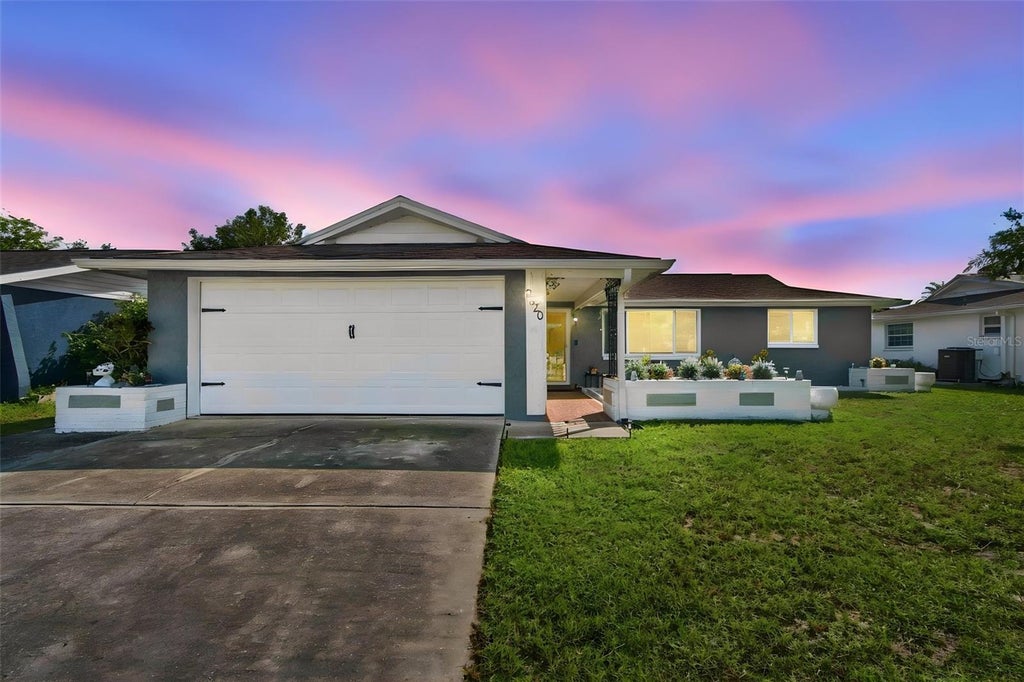 Photo of 9520 Glen Moor Lane, Port Richey, FL 34668 (MLS # TB8556873)