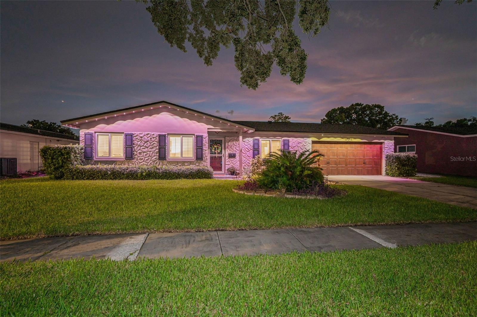 Beauty beyond compare at this Clearwater Gem! Welcome home to 1834 Albright Drive! This immaculate and model condition pool home is exquisitely appointed with manicured landscaping and a beautiful sprawling elevation with warm accents of a stone façade exterior detail! The home boasts 1933 heated square feet of luxury living in the heart of Clearwater within minutes to the best of the Gulf Coast Beaches, Shopping, Dining, Top Medical Facilities, the Arts and more! This beauty features 4 spacious bedrooms, 2 full baths, a large living room that welcomes you as you enter the home, and a totally remodeled to die for gourmet kitchen with plenty of cabinetry, a cooking island, gorgeous SS appliances and stunning new counter tops! The kitchen is literally the heart of this beautiful home and it over looks a generous sized family room for the family to gather and a massive dining room area perfect for entertaining your guests. The spacious primary suite has a nice size bath and comes with plenty of storage space. Tons of upgrades during ownership to include remodeled kitchen with updated cabinets, new countertops, a new refrigerator, freshly painted interior and exterior, a new AC system in Dec 2024, a new roof in Jan 2025, a new water heater in 2019, new Sod, updated irrigation System in 2024, and gorgeous new floors in all bedrooms to name a few! Other highlights include plantation shutters, thermal double pane windows, a water softener, updated light fixtures and ceiling fans, gorgeous outdoor lighting and much more. The SALT WATER and HEATED screened pool is an absolute Oasis to enjoy year round, with plenty of covered lanai space to enjoy, entertain and lounge too. The fully fenced yard is truly the perfect final touch! This one is a must see!! It is immaculate and ready for its new owners!
