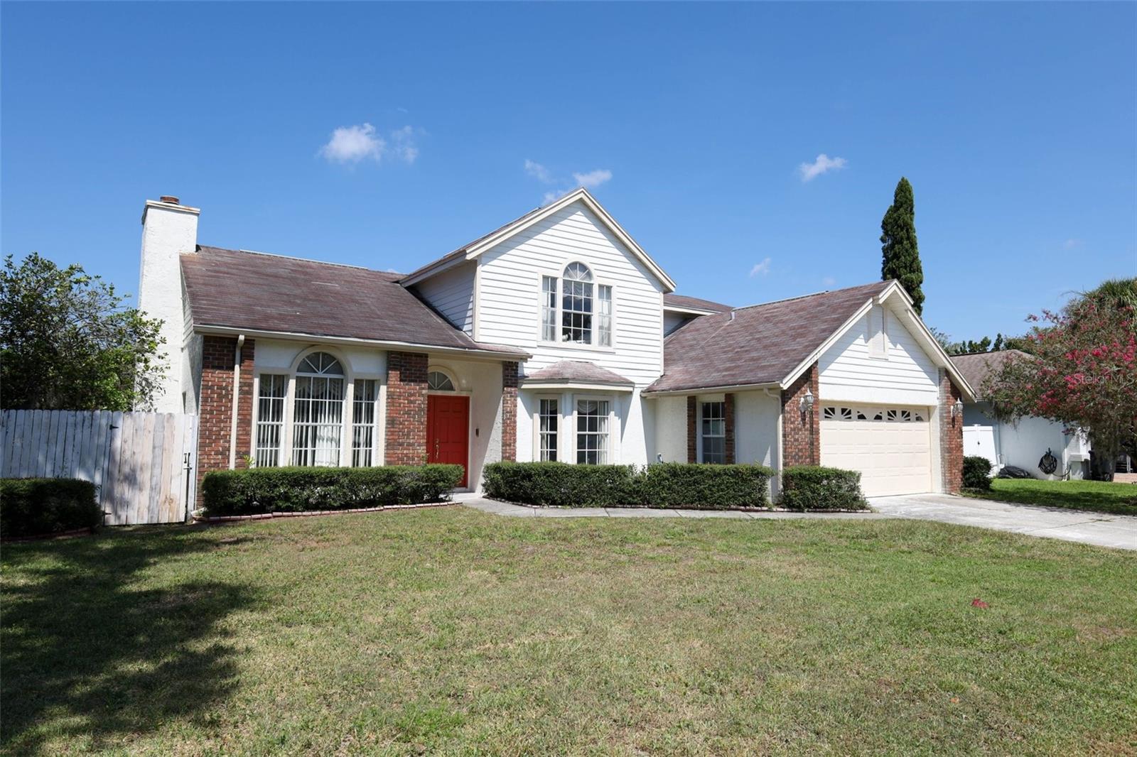 The potential is endless!! This 4-bedroom, 2.5 -bathroom 2 car garage home is ready for some TLC. With 2025 re-piping, 2023 water heater, 2021 A/C and a 25k credit at closing the possibility are endless. Seminole County School District is one of the best in Florida. Designed with a spacious split floor plan, the home features formal living and dining rooms, vaulted ceilings, and a cozy wood-burning fireplace in the great room. Step outside to a covered lanai—perfect for outdoor entertaining all year round, the backyard has grapefruit, Guava, banana, lemon and a Sugar apple tree which also gives you a little privacy. The spacious primary suite has a large walk-in closet, a bathroom with a tub, and walk-in shower. A separate laundry room offers ample storage and leads into the oversized 2-car garage. Additional highlights include Low HOA, no CDD fees and it is conveniently located near shopping, parks, Restaurants, top-rated schools, UCF, Seminole State College, and major roadways for an easy commute. Don't wait Call for showing now.
