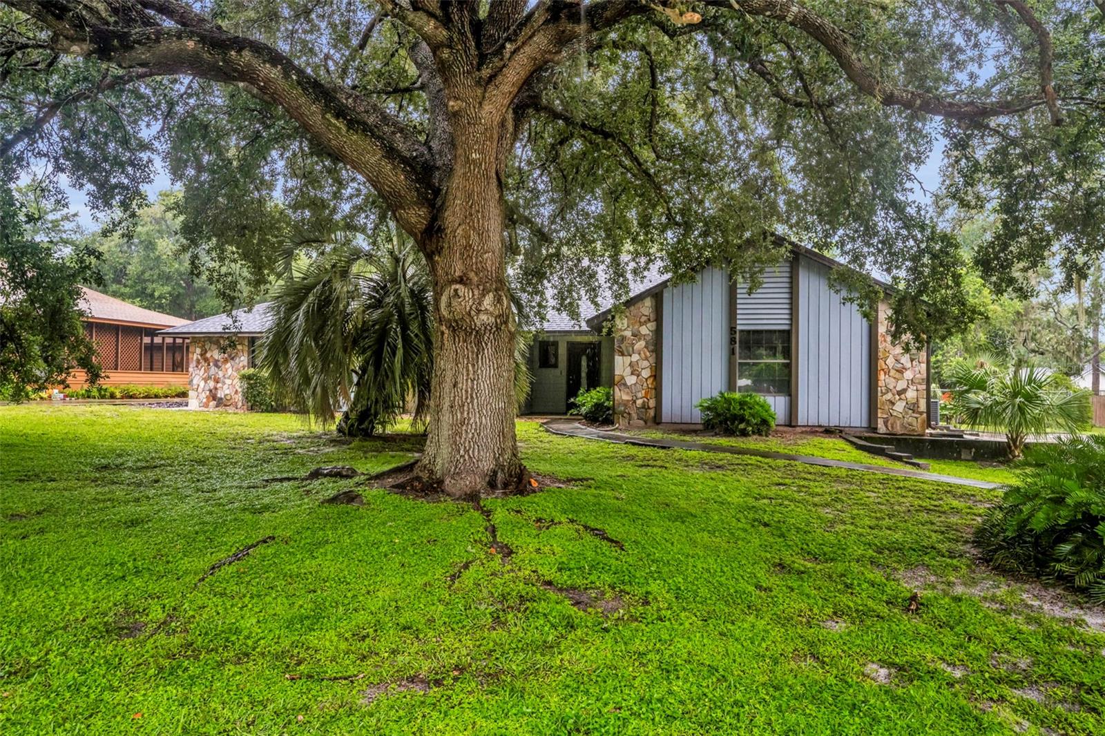 Set on over 1/3 of an acre in highly sought-after Oviedo! This 3-bedroom, 2-bath home offers the perfect combination of style and location. Enjoy a large living room with vaulted ceilings, a modern kitchen featuring STONE COUNTERTOPS and STAINLESS STEEL appliances, and a layout built for everyday living and entertaining. You're also equipped with a NEW AC(2023), NEWER HOT WATER HEATER(2020) & a NEWER SEPTIC drain field(2021). The primary suite features a BIG walk-in closet, UPDATED BATHROOM with dual vanities and an OVERSIZED walk-in shower that brings a spa-like touch to your daily routine. Step out back to your EXPANSIVE BACKYARD that offers endless potential for play, pets, gardening, or even a future pool! All this just minutes from Seminole County top-rated schools, parks, shops, and dining hotspots like The Town House Restaurant. If you’re looking for comfort, space, and unbeatable location, this Oviedo gem checks every box. Schedule a showing today!