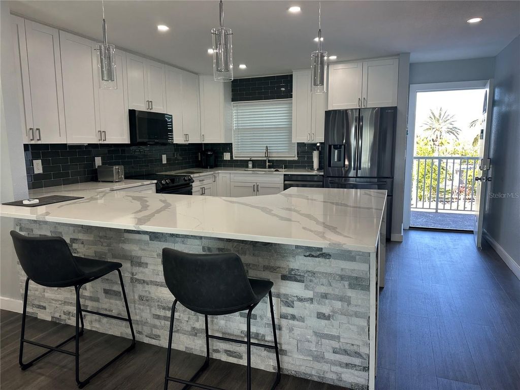 Photo of 300 64th Avenue #318, St Pete Beach, FL 33706 (MLS # TB8456926)