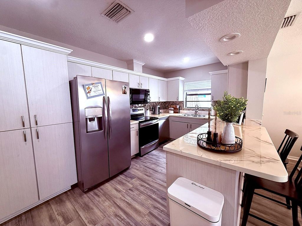 Photo of 7218 N Highland Avenue, Tampa, FL 33604 (MLS # TB8496446)