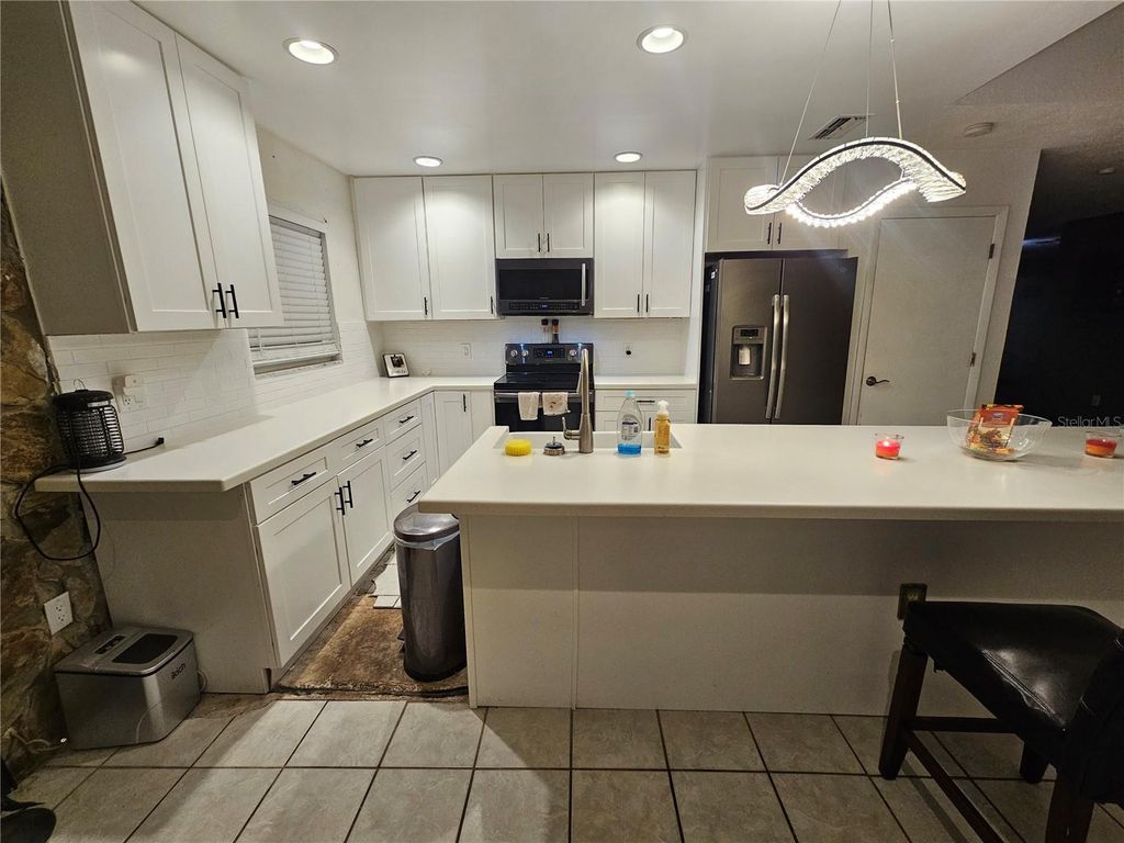 Photo of 12632 Buckhorn Drive, Hudson, FL 34669 (MLS # TB8454311)