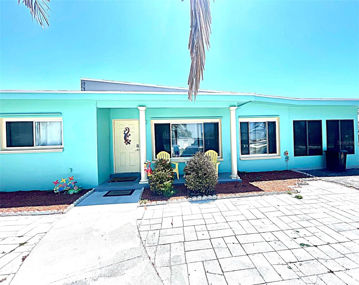 Welcome to our beautiful sunshine state. Enjoy fully remodeled four bedrooms, two baths' accommodations just steps away from our white, sandy beaches with our calm, warm gulf waters. Conveniently located with shops and restaurants around the corner and across the street from city hall. Don't miss this chance for paradise. Beach access is just across the street from this wonderful home. This property has been renovated after the flooding, checked for mold, brand new furniture, brand new appliances. Professionally decorated with a lovely beach motive. Perfect for the whole family including two pets. The living room has a beautiful, vaulted ceiling with classic beams. The kitchen has a skylight for extra natural light. The primary bedroom features a king bed and an in-suit bath with a full-sized washer dryer. One bedroom has two twin beds, another one has a queen bed, and the final bedroom has a work desk and twin bed. The back yard is fully fenced in with a shuffleboard, shaded area with table and chairs, perfect for a barbecue. Fantastic area with restaurants just on the corner, city hall across the street, and a convenance store less than five-minute walk away. Beach toys and a wagon are included. Come play on our sand and enjoy our warm waters. The famous John's Pass is just five minutes drive. Redington Beach Town Park is just two-minute drive or twenty-minute walk., it features a new playground, exercise area, basketball court and pavilion. Come stay with us and enjoy paradise. Price depends on season.