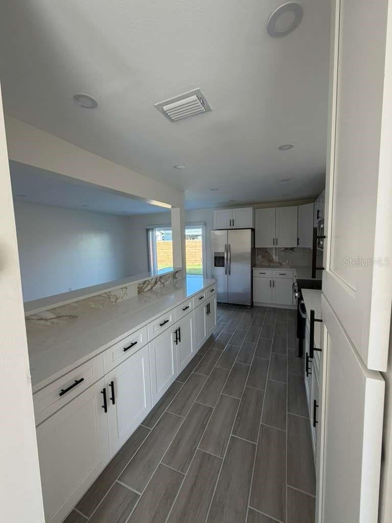 Photo of 2333 Meadow Cove Boulevard, Melbourne, FL 32935 (MLS # O6416916)