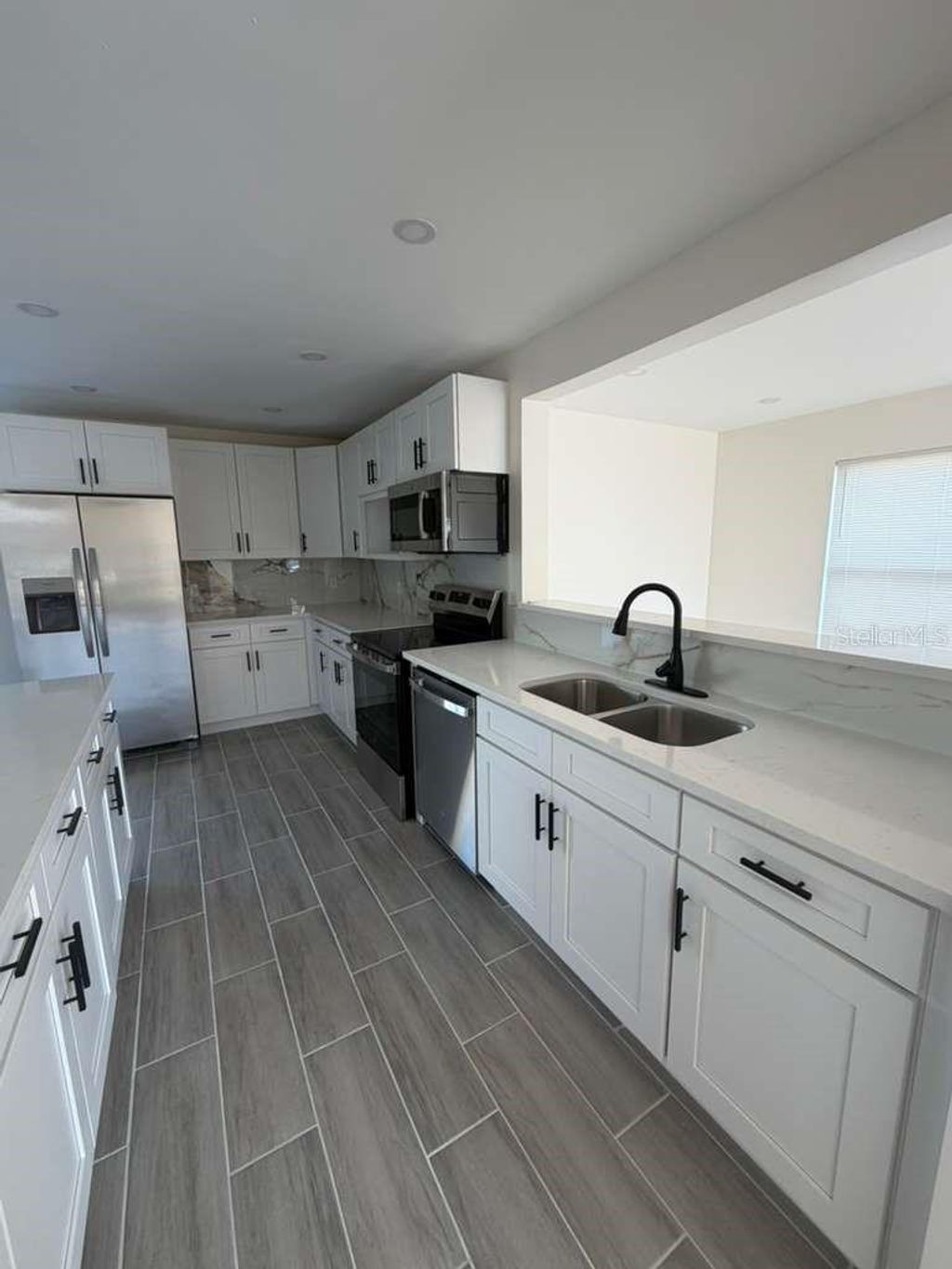 Photo of 2333 Meadow Cove Boulevard, Melbourne, FL 32935 (MLS # O6416916)