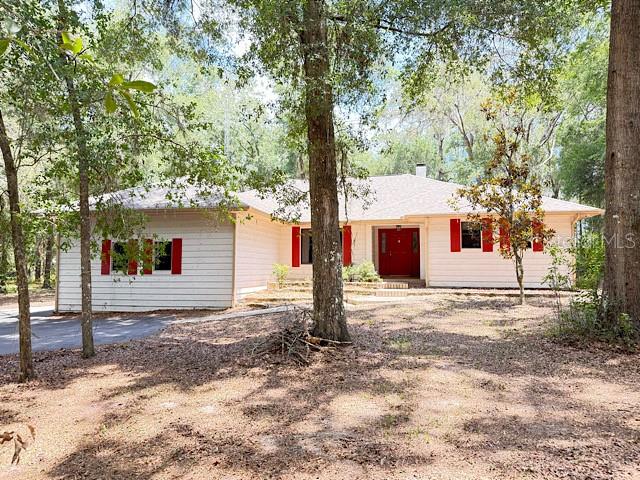 Charming 3 Bedroom, 2 Bathroom, 2 Car Garage home situated on a spacious 1.7 acre lot. This home features a cozy gas fireplace in the living room, split bedroom floor plan, and an enclosed porch for year-round enjoyment. This property offers peaceful country living just minutes from town conveniences. Don't miss the chance to make this gem your own! Call today to schedule your private showing!