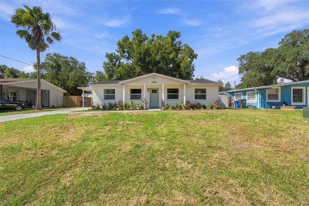 Photo of 10506 Alambra Avenue, Tampa, FL 33619 (MLS # TB8549038)