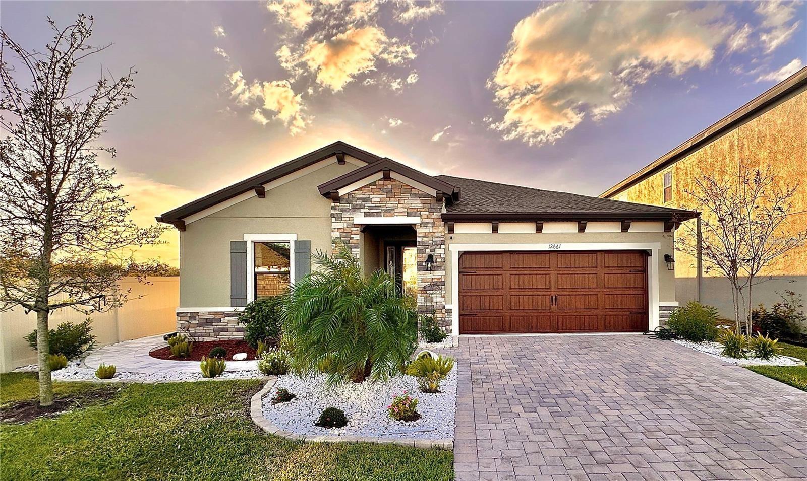 This beautifully kept home has everything you’re looking for! Built less than two years ago, it features modern upgrades including elegant lighting, ceiling fans, professional landscaping, a water softener system, accent wall, custom walk-in closet, paver patio and walkway, and more. The Sandpiper floor plan offers an open-concept design filled with natural light and includes a covered lanai for seamless indoor-outdoor living. The private owner’s suite is tucked away from the main living area and features two spacious walk-in closets and a luxurious bathroom with a large walk-in shower. Located in Crosswind Point, a 230-acre resort-style community in Parrish, FL, this neighborhood offers scenic water and nature views, a community amenity center, playgrounds, and pocket parks—all just minutes from US-301 and I-75. Don’t miss your chance to make this stunning home yours! Schedule a showing today!