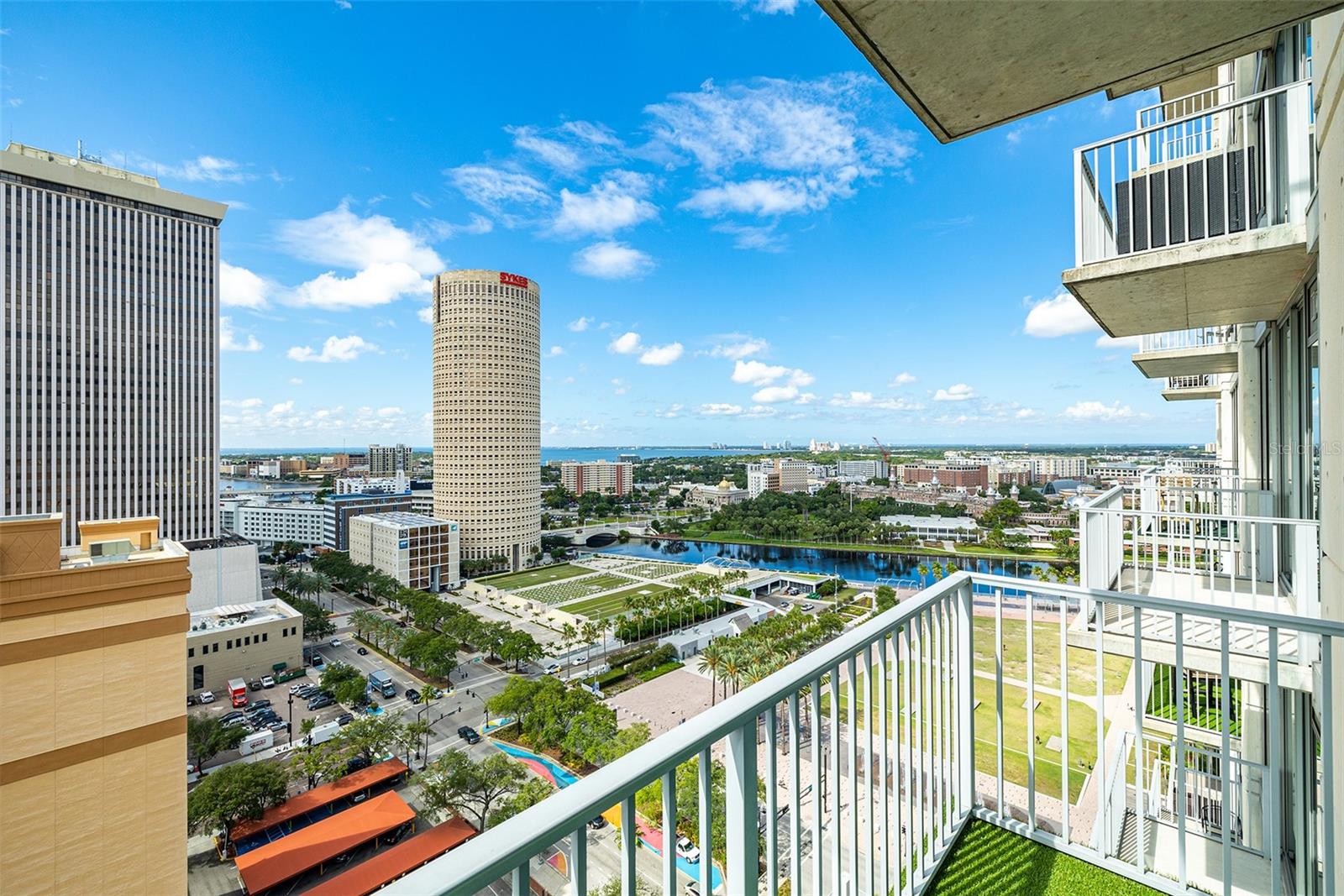 This is your opportunity to live in the most sought after building in Tampa, FL, Skypoint Condominiums. This massive 846 sqft condo is one of the largest 1 bedroom, 1 bathroom floorplans in the building and sports EPIC views of the Bay and Downtown skyline. Gorgeous wood floors are laid throughout the unit and floor to ceiling windows flood the unit with natural light. This is the epitome of Downtown Tampa living. This impeccably maintained unit is perfectly finished with granite counter tops, and stainless steel appliances. You'll love spending your evenings relaxing on your balcony in the sky as you watch the sunset on the horizon. Your future home is centrally located near Harbour Island, Channelside, Davis Island, Hyde Park, and just seconds away from Armature Works, the Cultural Arts District, Tampa Art Museum and Glazer Children's Museum, Amalie Arena, the Convention Center, the Riverwalk, and Bayshore. Community amenities include 24-hour concierge, controlled building access, 2 state-of-the-art gyms, a recently updated lap pool with Restoration Hardware pool furniture, hot tub, outdoor terrace with new fire pits, gas grills, and massive pergola, movie theatre, lounge area that over looks Curtis Hixon, pool table, clubroom with catering area, and secured fob access. HOA fees include internet, one reserved parking space, trash, and tons of services from your on-site concierge and property management teams. Call to schedule your private showing today!