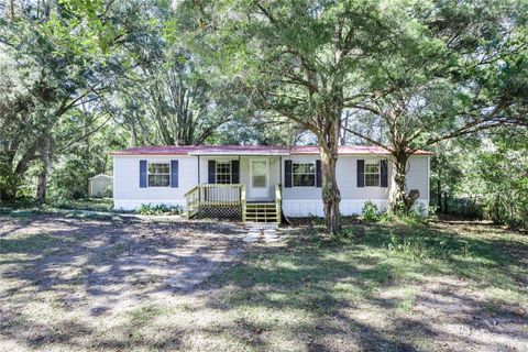 Photo of 7122 NW 200th Terrace, Alachua, FL 32615 (MLS # GC535457)