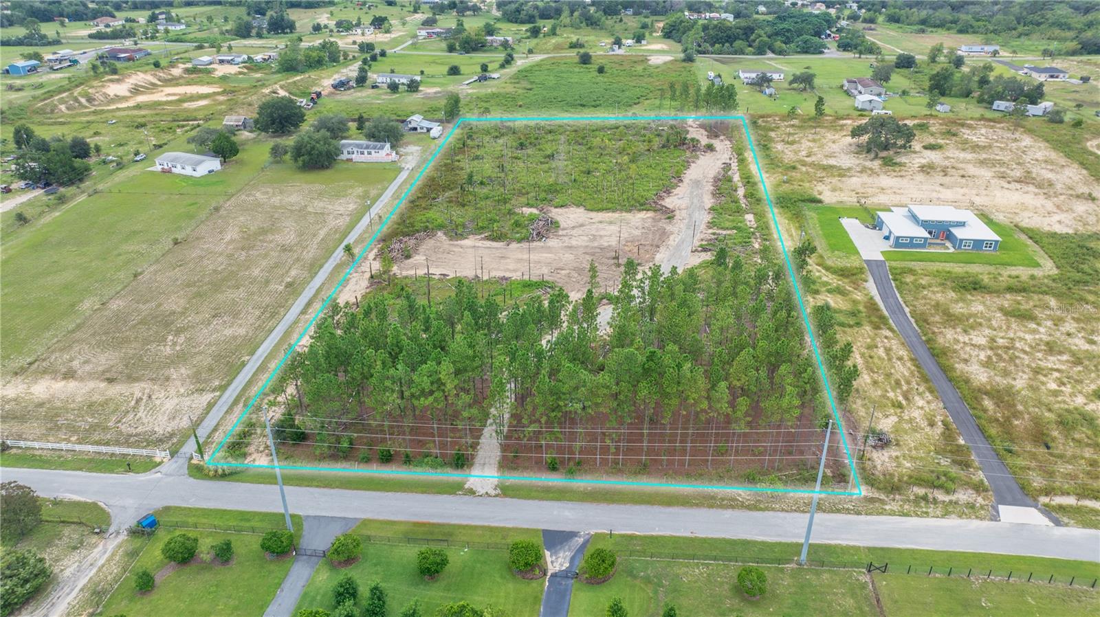 Unlock the potential of this beautiful 4.9-acre lot, elevated on a hill with generous dimensions of 330x644 feet. This expansive property provides ample space for all your endeavors. Enjoy easy access via a paved road and peace of mind with no flood plain concerns. Zoned Agricultural (AG), the lot is perfect for various uses. Whether you’re looking to build a custom home or pursuing farming ventures. Experience the best of both worlds with a peaceful, expansive space. Don’t miss out on this unique opportunity!