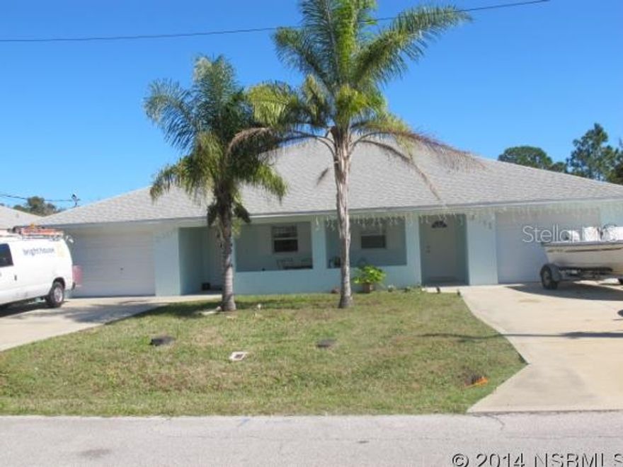 Spacious open floor plan.  Large kitchen with lots of counter space and cabinets.  Screened in back porch.  W/D hookup in garage.  Neighborhood with very little traffic. Conveniently located just West of World Famous Mosquito Lagoon fishing paradise!  This duplex provides many features that make it attractive for keeping long term tenants. ;Water: City