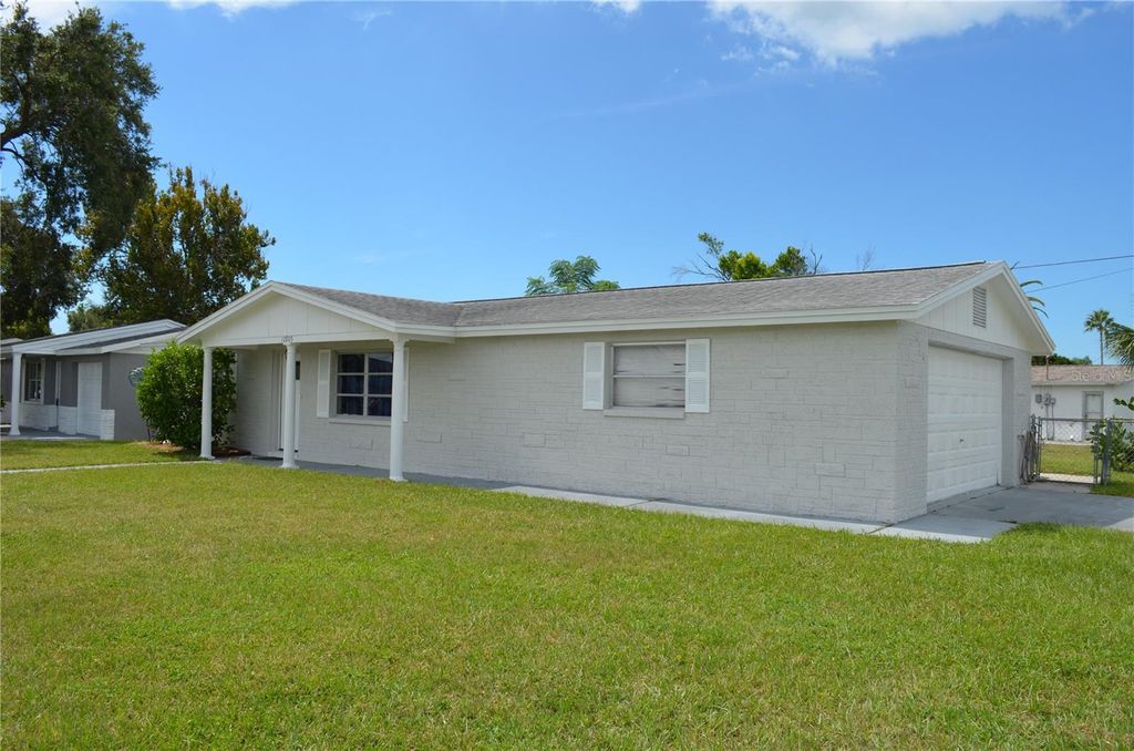 Photo of 10905 Scenic Drive, Port Richey, FL 34668 (MLS # W7877506)