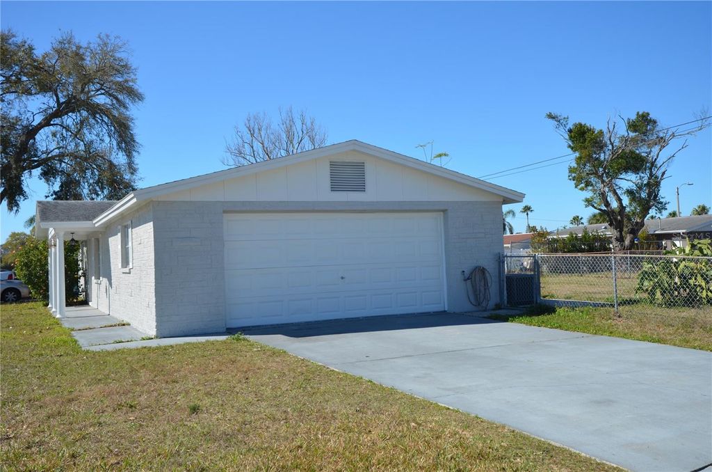 Photo of 10905 Scenic Drive, Port Richey, FL 34668 (MLS # W7877506)
