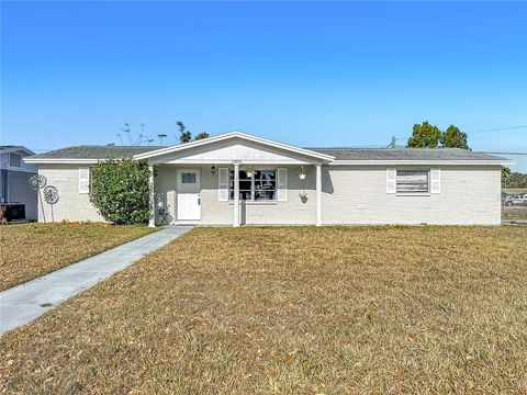 Photo of 10905 Scenic Drive, Port Richey, FL 34668 (MLS # W7877506)