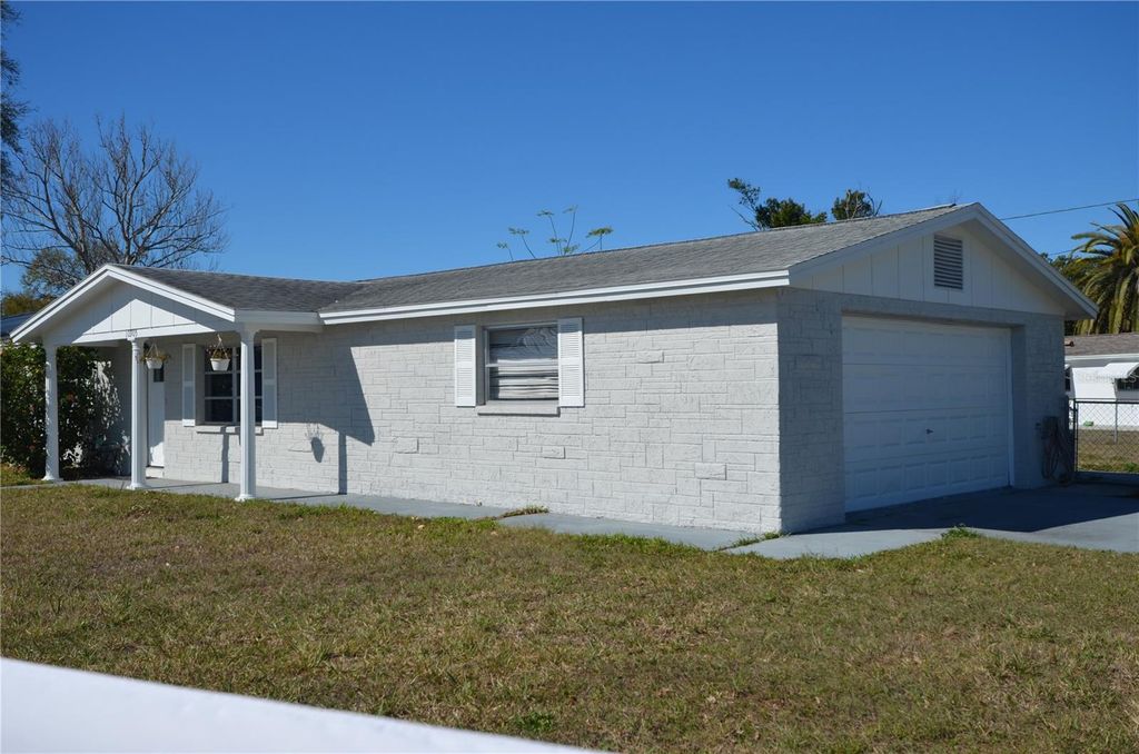 Photo of 10905 Scenic Drive, Port Richey, FL 34668 (MLS # W7877506)