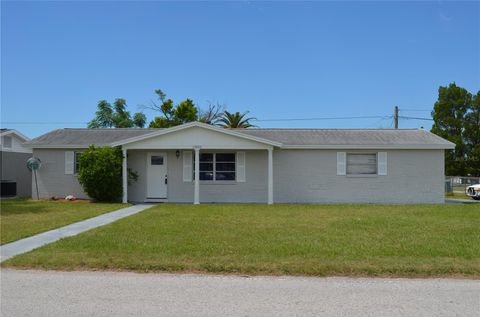 Photo of 10905 Scenic Drive, Port Richey, FL 34668 (MLS # W7877506)