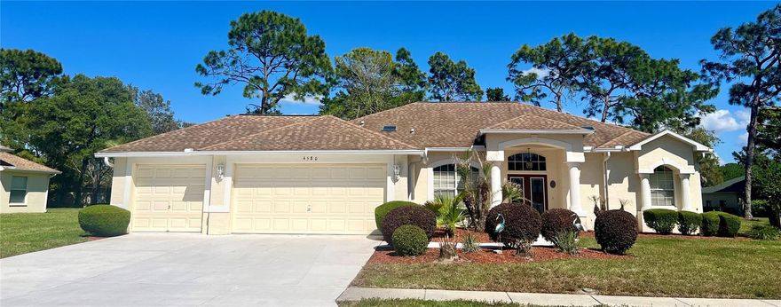 One or more photo(s) has been virtually staged. Home Sweet Home!  Welcome to this beautiful 4 bedroom, 3 bath, 3 car garage pool home in the gated golf community of Silverthorn. Offering 2,321 square feet of living space, this home captures classic Florida living at it's best.  Enjoy an eat in kitchen with newer stainless steel appliances, ceramic tile flooring, plenty of storage, and a layout designed for both comfort and function.  Step outside to admire the manicured landscaping and relax in your own private pool.  This Silverthorn gem combines space, style, and the security of gated living.