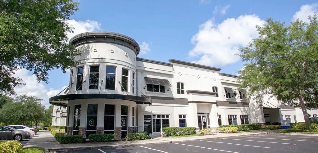 Photo of 12211 Regency Village Drive #9, Orlando, FL 32821 (MLS # O6349666)