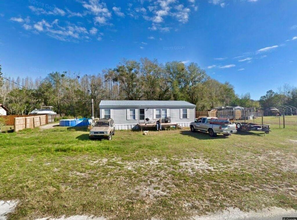 Photo of 7536 Moffitt Road, Land O Lakes, FL 34638 (MLS # TB8478928)