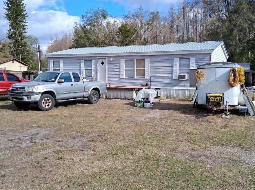 Well-maintained 3 bedroom, 2 bathroom manufactured home (1995 build) offering 1,012 sqft of living space situated on a spacious .23-acre lot with plenty of room to spread out. The home features central A/C, a metal roof in fantastic condition, and a large detached workshop in the backyard, excellent for storage, hobbies, or equipment. Great overall condition, fantastic location, and strong upside potential for investors or buyers looking for value. Don’t miss this opportunity!