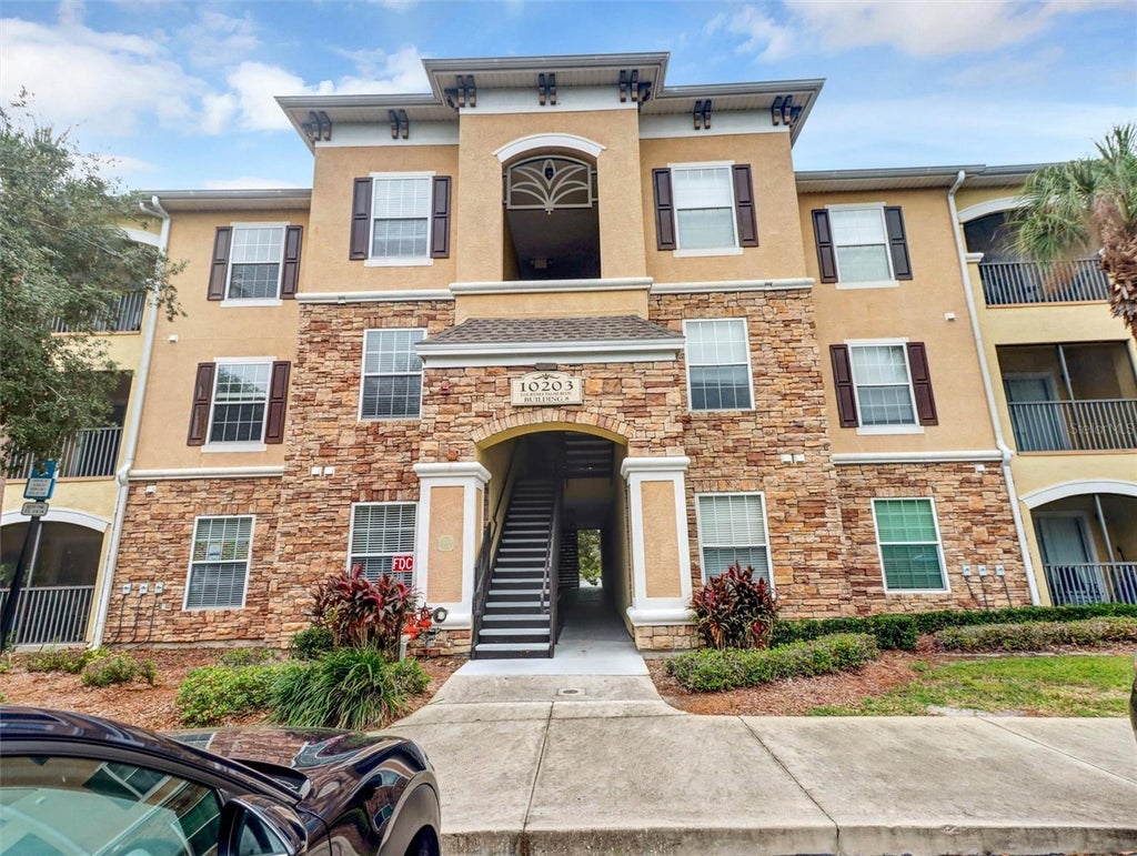 Photo of 10203 Courtney Palms Boulevard #202, Tampa, FL 33619 (MLS # TB8560345)