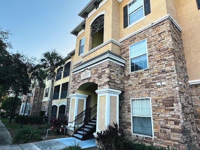 Photo of 10203 Courtney Palms Boulevard #202, Tampa, FL 33619 (MLS # TB8560345)
