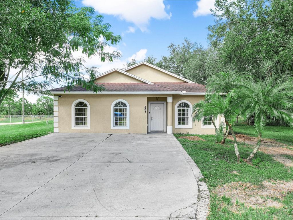 Photo of 403 Appaloosa Avenue, Clewiston, FL 33440 (MLS # C7516230)