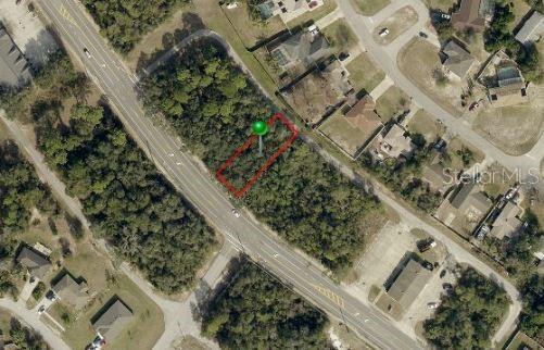 Photo of 740 Fort Smith Boulevard, Deltona, FL 32738 (MLS # O6416764)