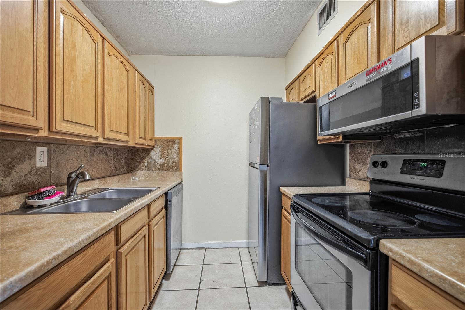 OAKS CONDOMINIUM - Residential